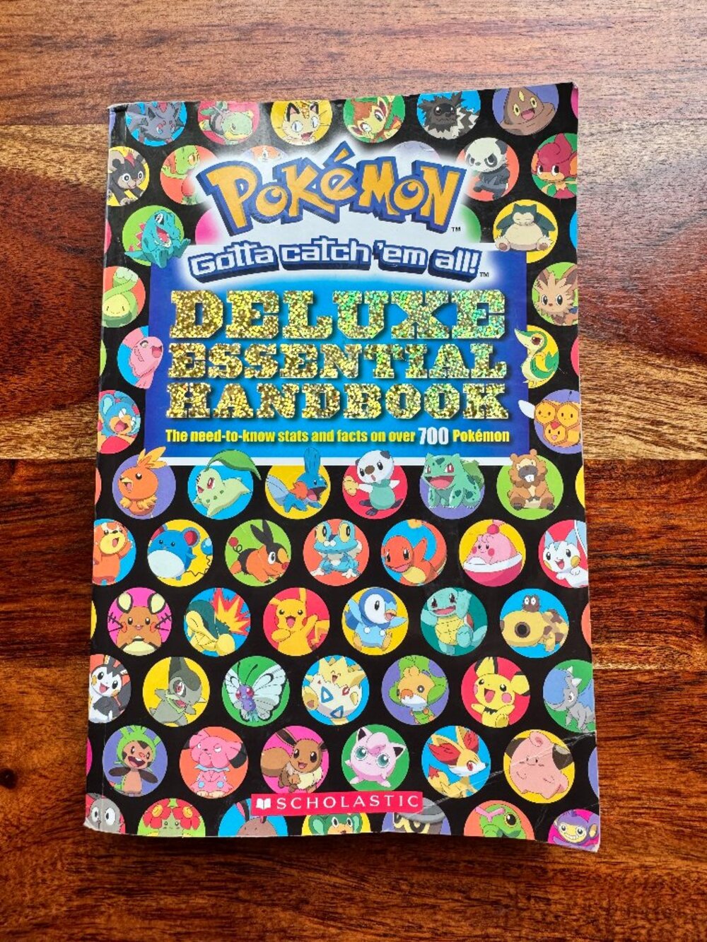 Pokemon Deluxe Essential Handbook – Scholastic 2015 Paperback